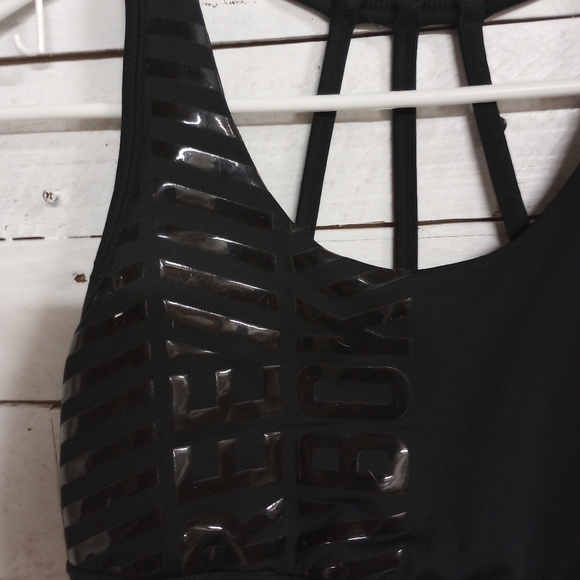 Reebok Burst Bra Size Medium with Medium Support Shiny Black Logo on Chest - Picture 2 of 7